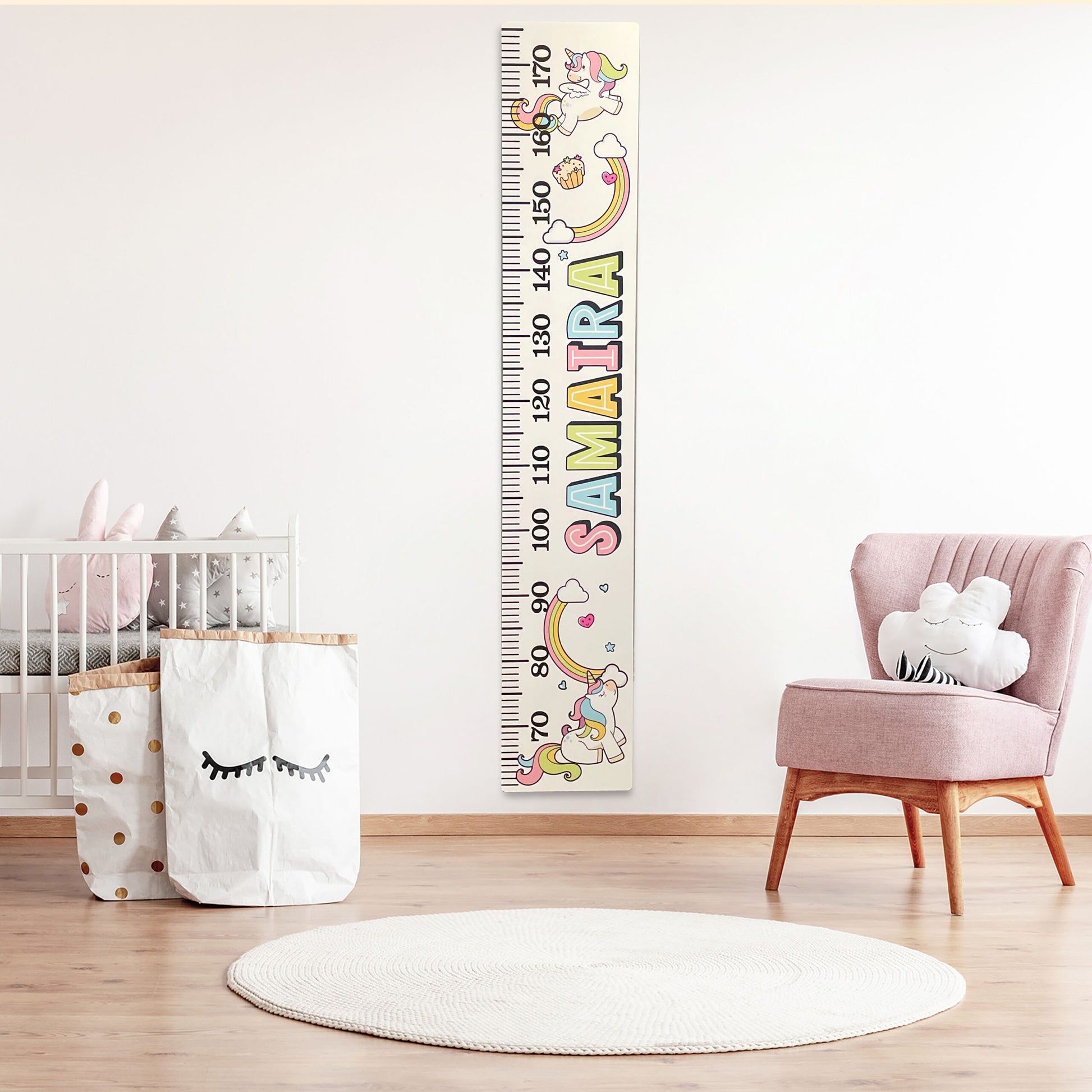 Bright scandinavian baby room with rocking horse, white nursery